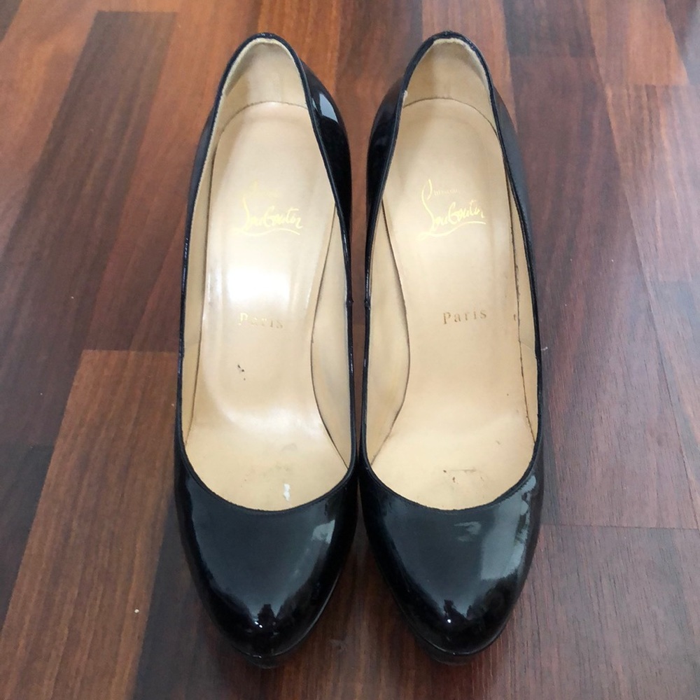 Christian Louboutin black pumps